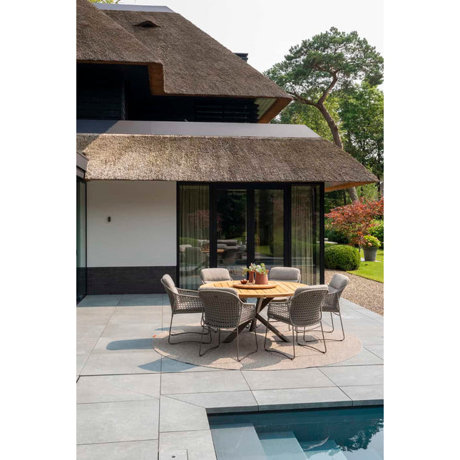 4 Seasons Outdoor Moretti high back dining stoel + Taste 4SO Prado teak tafel 130 Ø cm